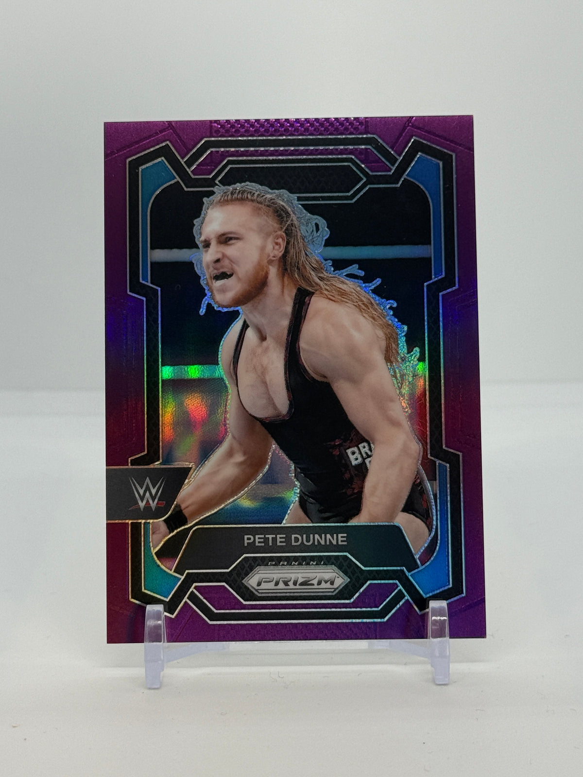 2024 Panini Prizm WWE Pete Dunne #131 - Purple Prizm 023/149 - Raw - front
